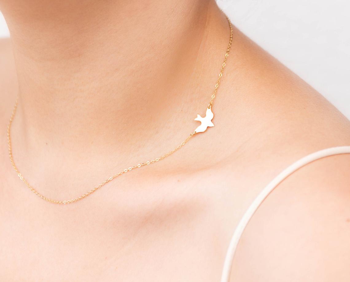 Gold bird choker necklace